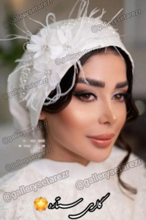 توربان مجلسی مدل گل بابونه با دیزاین مروارید و پر